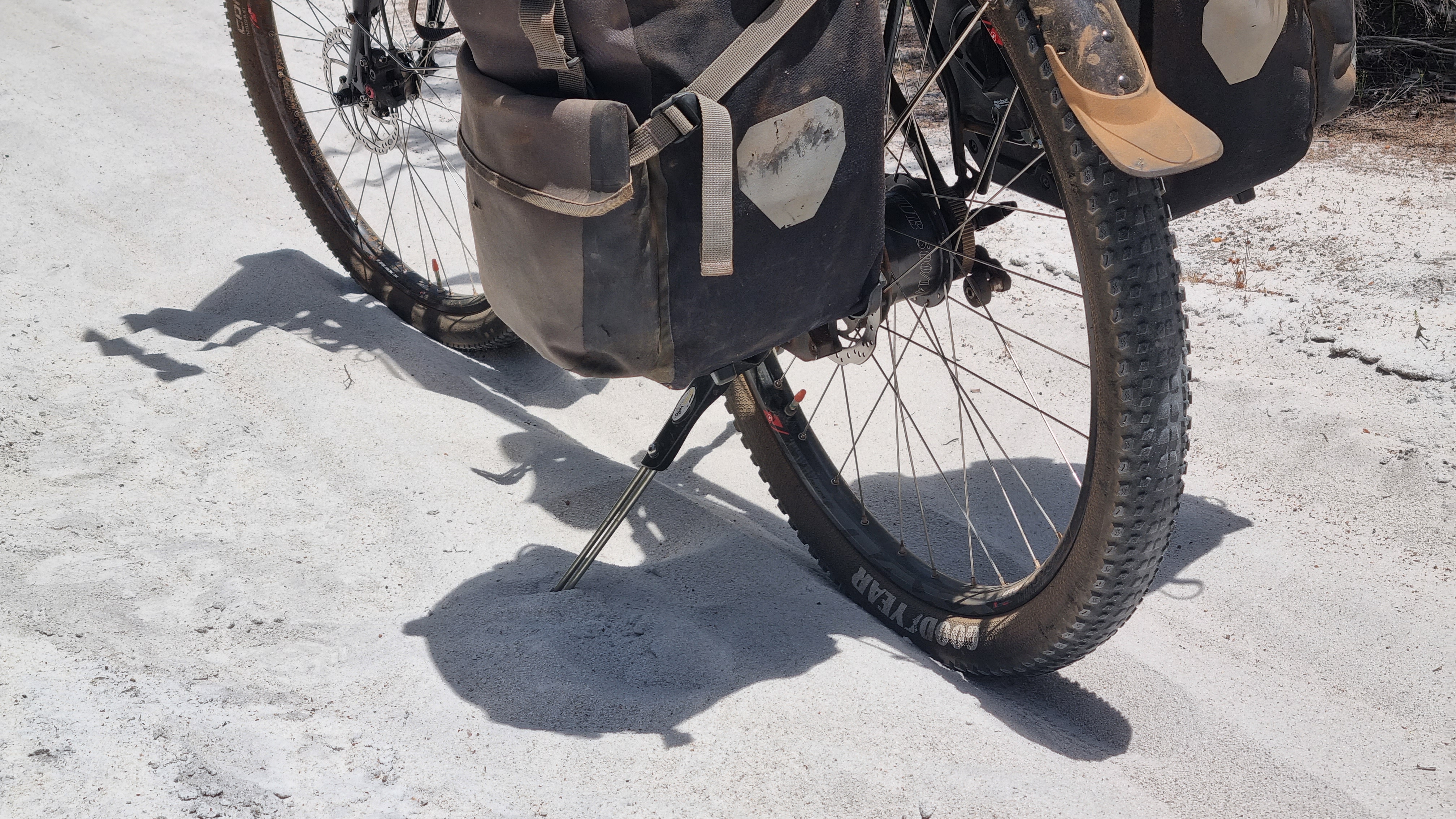 A vivente touring bike sitting on a sandy stretch of the Munda Biddi trail